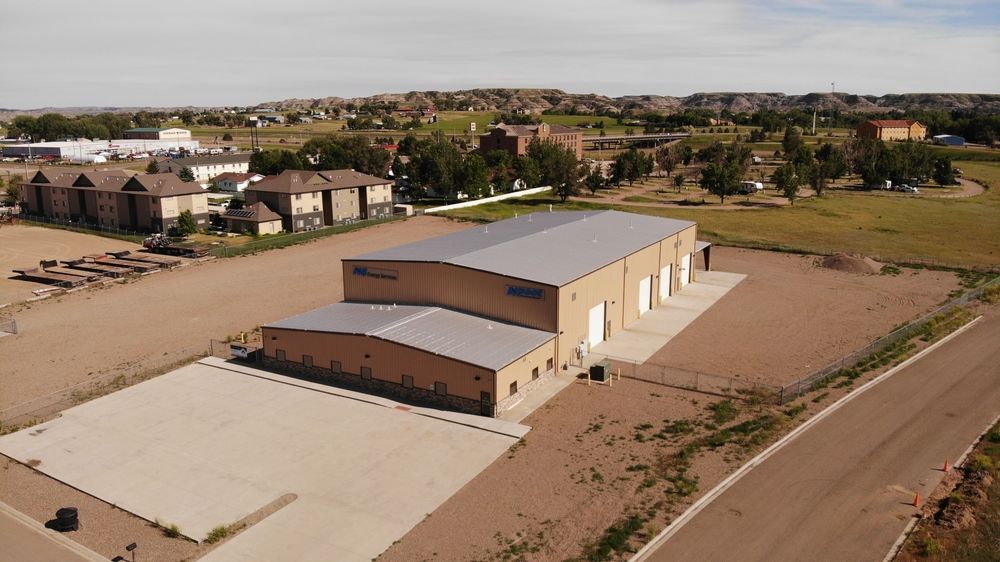 Functional +/-18,000+ SQ FT Shop on 3.11 Acres in Glendive, MT: 123 W Oregon Ln, Glendive, MT 59330